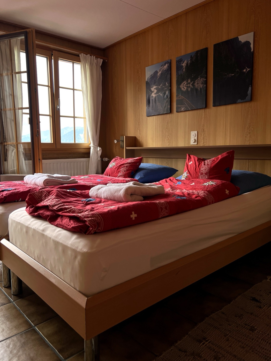 Twin room with a window on the sunny side